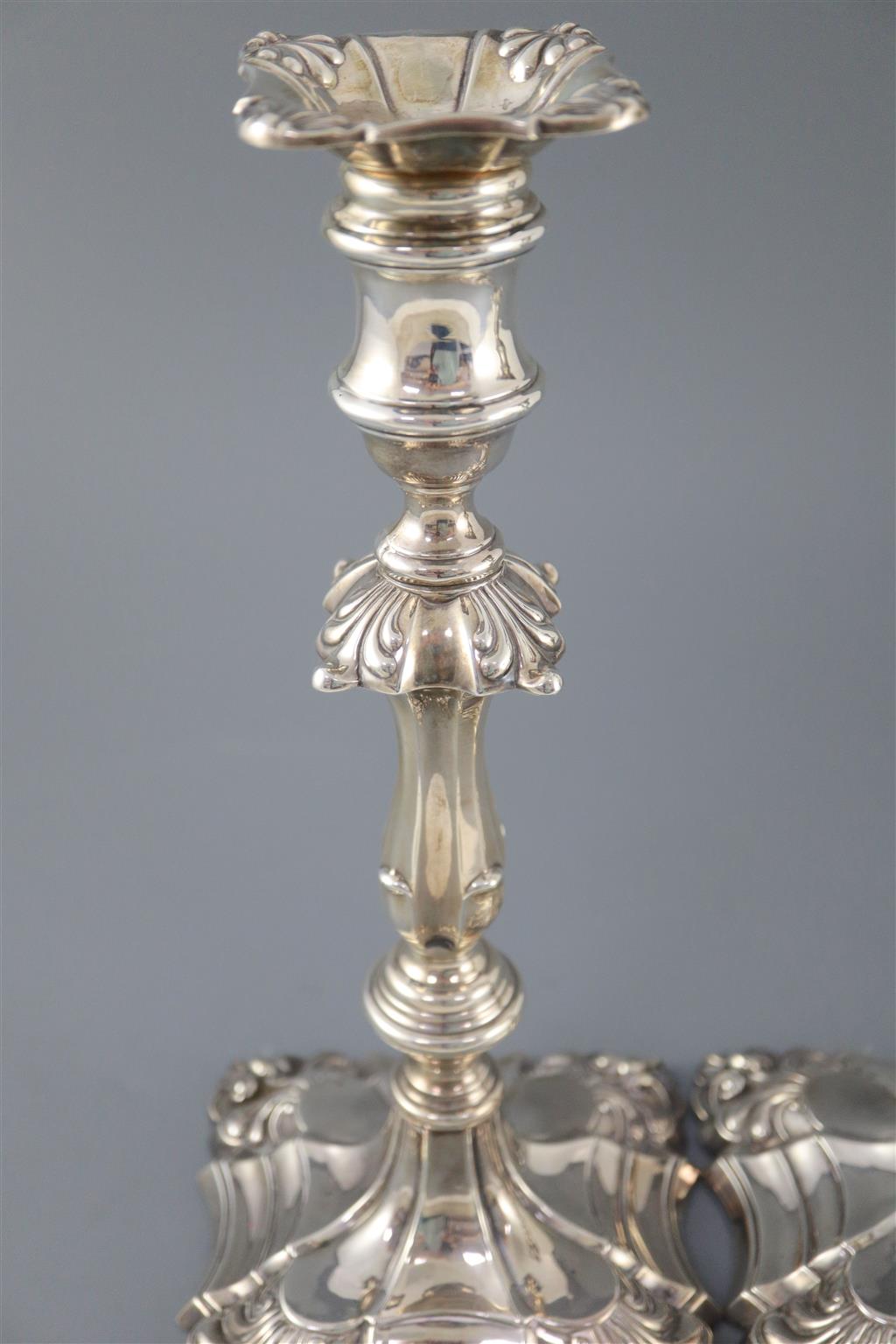 A pair of Edwardian silver candlesticks by William Hutton & Sons,